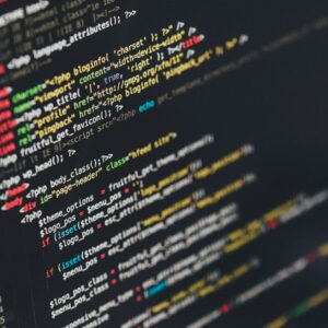 Website source code displayed on a monitor